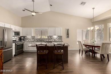 Turn-key! This popular Augusta floorplan is tucked away in a on Tuscany Falls At Pebble Creek in Arizona - for sale on GolfHomes.com, golf home, golf lot