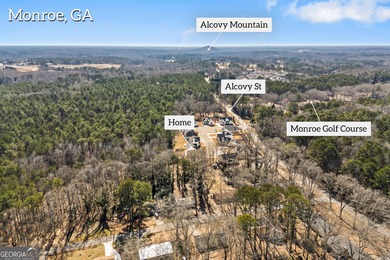 New construction farmhouse walking distance (or take your golf on Monroe Golf and Country Club in Georgia - for sale on GolfHomes.com, golf home, golf lot