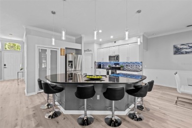 SELLERS ARE NOW PAYING OFF THE SOLAR PANELS AT CLOSING! SOLAR on Glen Abbey Golf Club in Florida - for sale on GolfHomes.com, golf home, golf lot