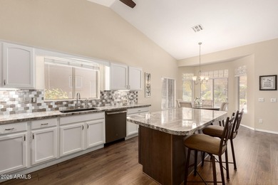 Turn-key! This popular Augusta floorplan is tucked away in a on Tuscany Falls At Pebble Creek in Arizona - for sale on GolfHomes.com, golf home, golf lot