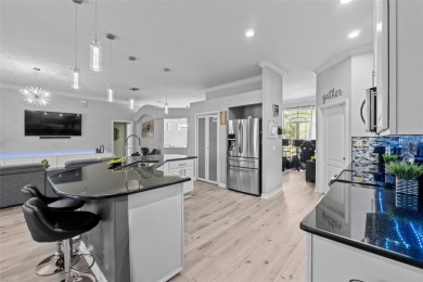 SELLERS ARE NOW PAYING OFF THE SOLAR PANELS AT CLOSING! SOLAR on Glen Abbey Golf Club in Florida - for sale on GolfHomes.com, golf home, golf lot