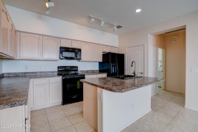 Lovely home located on a charming tree-lined street in the heart on StoneRidge Golf Course in Arizona - for sale on GolfHomes.com, golf home, golf lot