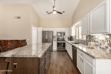 Turn-key! This popular Augusta floorplan is tucked away in a on Tuscany Falls At Pebble Creek in Arizona - for sale on GolfHomes.com, golf home, golf lot