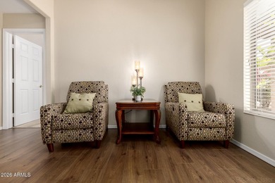 Turn-key! This popular Augusta floorplan is tucked away in a on Tuscany Falls At Pebble Creek in Arizona - for sale on GolfHomes.com, golf home, golf lot