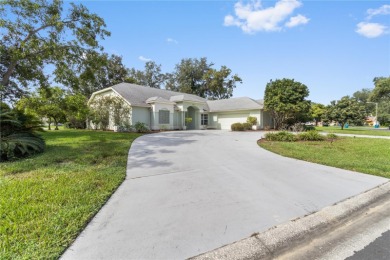 Welcome to your dream retreat in the gated Glen Lakes golf on Glen Lakes Country Club in Florida - for sale on GolfHomes.com, golf home, golf lot