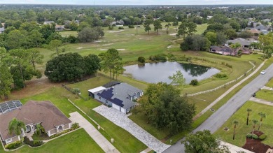 SELLERS ARE NOW PAYING OFF THE SOLAR PANELS AT CLOSING! SOLAR on Glen Abbey Golf Club in Florida - for sale on GolfHomes.com, golf home, golf lot