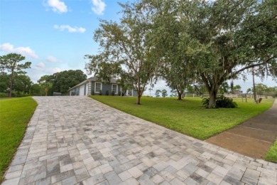 SELLERS ARE NOW PAYING OFF THE SOLAR PANELS AT CLOSING! SOLAR on Glen Abbey Golf Club in Florida - for sale on GolfHomes.com, golf home, golf lot