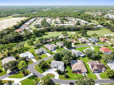 Welcome to your dream retreat in the gated Glen Lakes golf on Glen Lakes Country Club in Florida - for sale on GolfHomes.com, golf home, golf lot