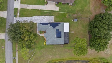 SELLERS ARE NOW PAYING OFF THE SOLAR PANELS AT CLOSING! SOLAR on Glen Abbey Golf Club in Florida - for sale on GolfHomes.com, golf home, golf lot