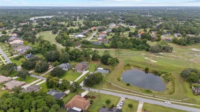 SELLERS ARE NOW PAYING OFF THE SOLAR PANELS AT CLOSING! SOLAR on Glen Abbey Golf Club in Florida - for sale on GolfHomes.com, golf home, golf lot