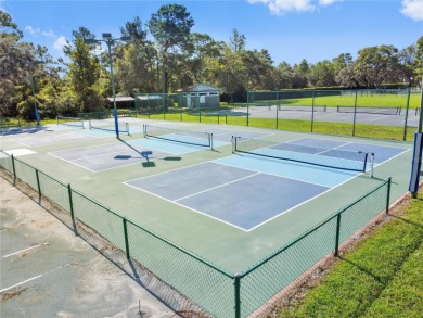 Welcome to your dream retreat in the gated Glen Lakes golf on Glen Lakes Country Club in Florida - for sale on GolfHomes.com, golf home, golf lot