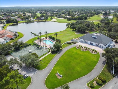Welcome to your dream retreat in the gated Glen Lakes golf on Glen Lakes Country Club in Florida - for sale on GolfHomes.com, golf home, golf lot