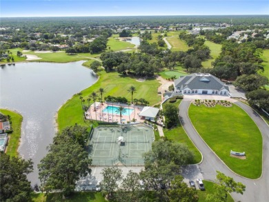 Welcome to your dream retreat in the gated Glen Lakes golf on Glen Lakes Country Club in Florida - for sale on GolfHomes.com, golf home, golf lot
