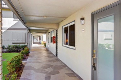 Must See! First Floor corner unit with Impact windows and Impact on Kings Point Golf - Executive in Florida - for sale on GolfHomes.com, golf home, golf lot