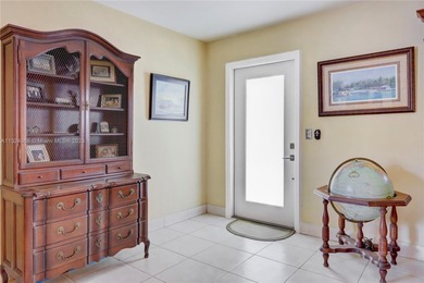 Must See! First Floor corner unit with Impact windows and Impact on Kings Point Golf - Executive in Florida - for sale on GolfHomes.com, golf home, golf lot