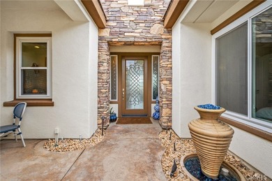 Premier Tamarisk model overlooking the 11th green of Trilogy on Golf Club At La Quinta in California - for sale on GolfHomes.com, golf home, golf lot