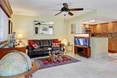 Must See! First Floor corner unit with Impact windows and Impact on Kings Point Golf - Executive in Florida - for sale on GolfHomes.com, golf home, golf lot
