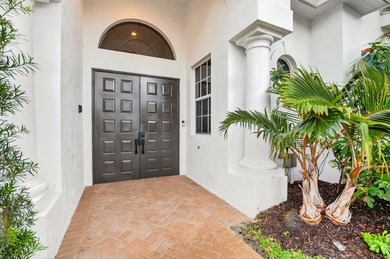 Stunning courtyard home in Mizner Country Club offering on Mizner Country Club in Florida - for sale on GolfHomes.com, golf home, golf lot