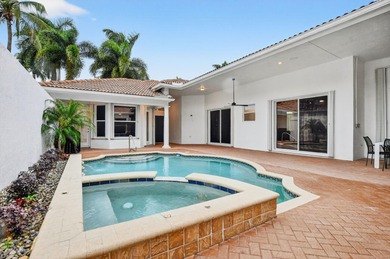 Stunning courtyard home in Mizner Country Club offering on Mizner Country Club in Florida - for sale on GolfHomes.com, golf home, golf lot