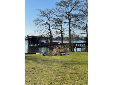 Large Family Camp Near Club on Lake Bruin Golf and Country Club in Louisiana - for sale on GolfHomes.com, golf home, golf lot