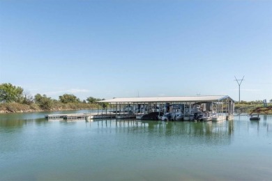Love playing golf? Love the lake? Or both? Then this lot is for on The Club At Runaway Bay in Texas - for sale on GolfHomes.com, golf home, golf lot