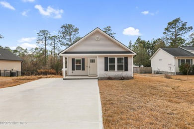 Better than new, this 1 year old 2/2 cozy cottage is adorable! on The Lakes Country Club in North Carolina - for sale on GolfHomes.com, golf home, golf lot
