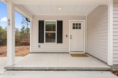 Better than new, this 1 year old 2/2 cozy cottage is adorable! on The Lakes Country Club in North Carolina - for sale on GolfHomes.com, golf home, golf lot