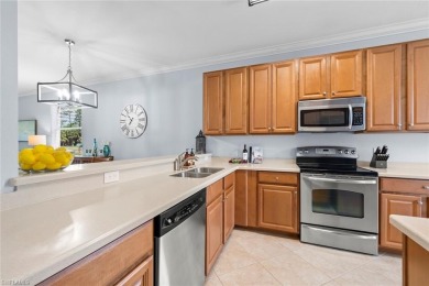 Light-Filled First Floor End Unit in Heritage Bay with FULL GOLF on Heritage Bay Golf Course in Florida - for sale on GolfHomes.com, golf home, golf lot