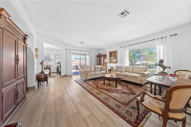 Located in Sun City MacDonald Ranch, this popular single-story on Desert Willow Golf Course in Nevada - for sale on GolfHomes.com, golf home, golf lot