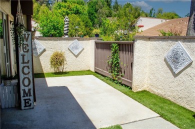 Location, Location. This Vista Valencia Townhome is conveniently on Vista Valencia Golf Course in California - for sale on GolfHomes.com, golf home, golf lot