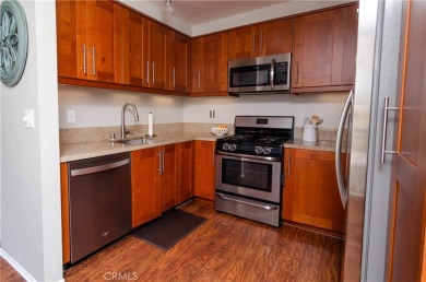 Location, Location. This Vista Valencia Townhome is conveniently on Vista Valencia Golf Course in California - for sale on GolfHomes.com, golf home, golf lot