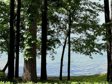 LAKE THUNDERBIRD LOT plus 2016 sq. ft. m/l home-with great LAKE on Cherokee Village North Course in Arkansas - for sale on GolfHomes.com, golf home, golf lot