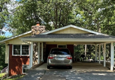 LAKE THUNDERBIRD LOT plus 2016 sq. ft. m/l home-with great LAKE on Cherokee Village North Course in Arkansas - for sale on GolfHomes.com, golf home, golf lot