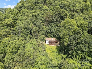 Welcome to your charming 2 bed, 2 1/2 bath mountain retreat with on Maggie Valley Resort and Country Club in North Carolina - for sale on GolfHomes.com, golf home, golf lot