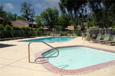 Location, Location. This Vista Valencia Townhome is conveniently on Vista Valencia Golf Course in California - for sale on GolfHomes.com, golf home, golf lot