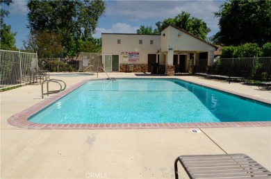 Location, Location. This Vista Valencia Townhome is conveniently on Vista Valencia Golf Course in California - for sale on GolfHomes.com, golf home, golf lot
