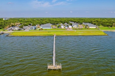 Welcome to this spacious Heron's Roost retreat under the trees! on Rockport Country Club in Texas - for sale on GolfHomes.com, golf home, golf lot