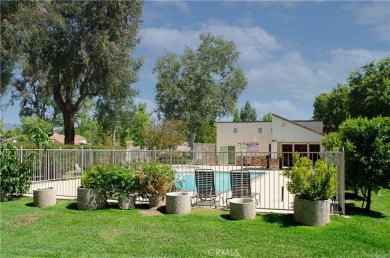 Location, Location. This Vista Valencia Townhome is conveniently on Vista Valencia Golf Course in California - for sale on GolfHomes.com, golf home, golf lot