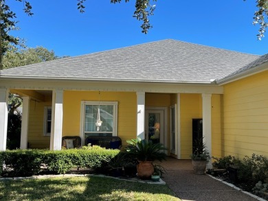 Welcome to this spacious Heron's Roost retreat under the trees! on Rockport Country Club in Texas - for sale on GolfHomes.com, golf home, golf lot