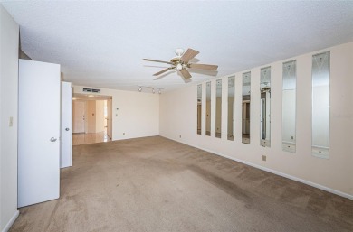 ** REDUCED PRICE ** Enjoy paradise in this comfortable on Isla Del Sol Yacht and Country Club in Florida - for sale on GolfHomes.com, golf home, golf lot