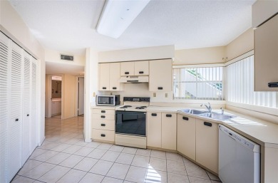 ** REDUCED PRICE ** Enjoy paradise in this comfortable on Isla Del Sol Yacht and Country Club in Florida - for sale on GolfHomes.com, golf home, golf lot