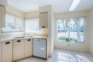 ** REDUCED PRICE ** Enjoy paradise in this comfortable on Isla Del Sol Yacht and Country Club in Florida - for sale on GolfHomes.com, golf home, golf lot