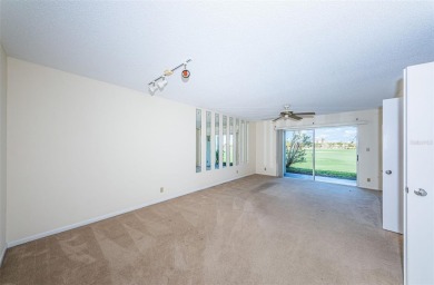 ** REDUCED PRICE ** Enjoy paradise in this comfortable on Isla Del Sol Yacht and Country Club in Florida - for sale on GolfHomes.com, golf home, golf lot