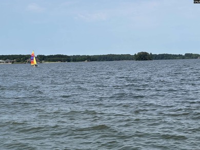 This exceptional and generous .29-acre homesite offers a serene on Timberlake Country Club in South Carolina - for sale on GolfHomes.com, golf home, golf lot