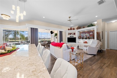 PRESTINE KISSIMMEE BAY GOLF AND WATER VIEW POOL HOME, Prepare to on Kissimmee Bay Country Club in Florida - for sale on GolfHomes.com, golf home, golf lot