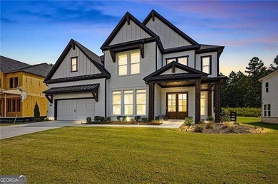 Welcome home to this executive home built by the Toll Brothers on Capital City Club Crabapple in Georgia - for sale on GolfHomes.com, golf home, golf lot