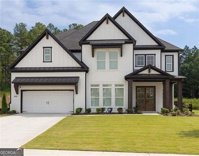 Welcome home to this executive home built by the Toll Brothers on Capital City Club Crabapple in Georgia - for sale on GolfHomes.com, golf home, golf lot