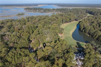 Enjoy views of Magnolia #5 green/lagoon from your main living on Callawassie Island Club in South Carolina - for sale on GolfHomes.com, golf home, golf lot