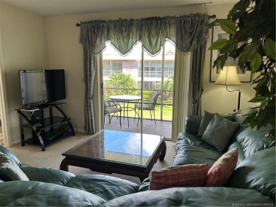 Great location of this 2 bedroom 2 bath 2nd floor corner unit on Monterey Yacht and Country Club in Florida - for sale on GolfHomes.com, golf home, golf lot