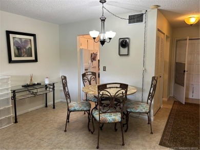 Great location of this 2 bedroom 2 bath 2nd floor corner unit on Monterey Yacht and Country Club in Florida - for sale on GolfHomes.com, golf home, golf lot